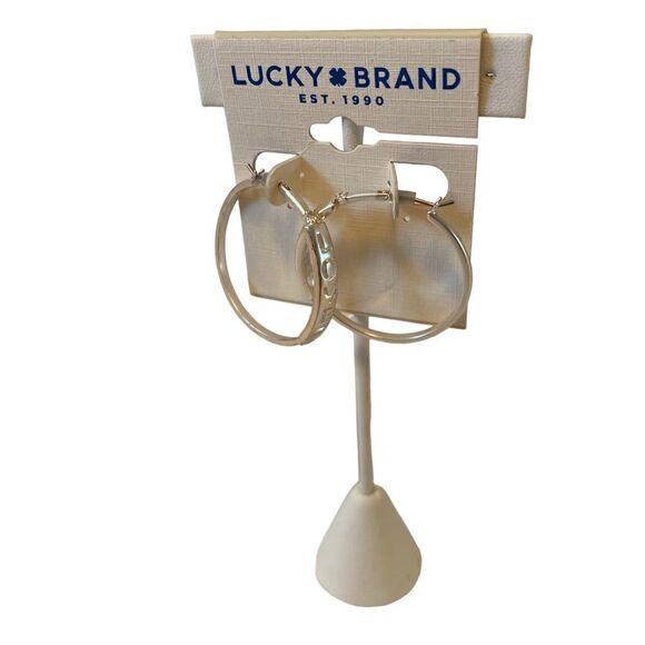 Matte Silver Toned Embossed “Love” Hoop Earrings. - Picture 3 of 6